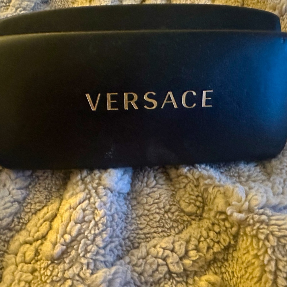 Set of two Versace sunglasses cases